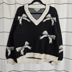 DAVI & DANI Black V-Neck Sweater with Cream Bow Accents